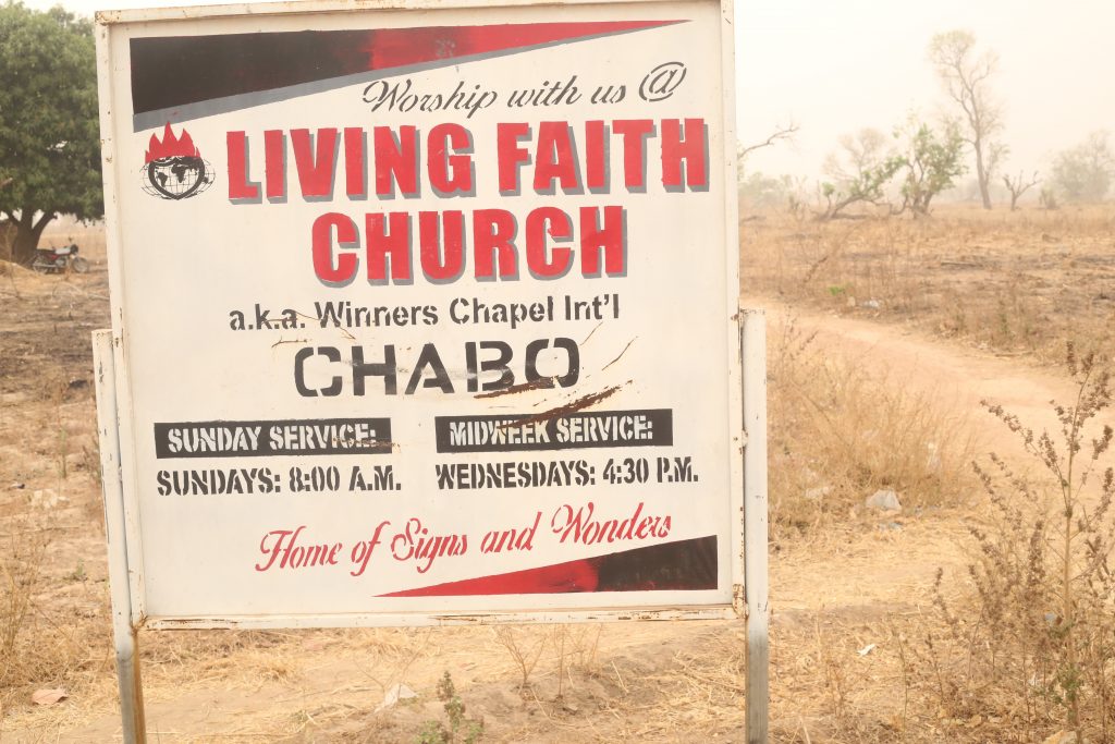 A Living Faith Church sign post in Chabo