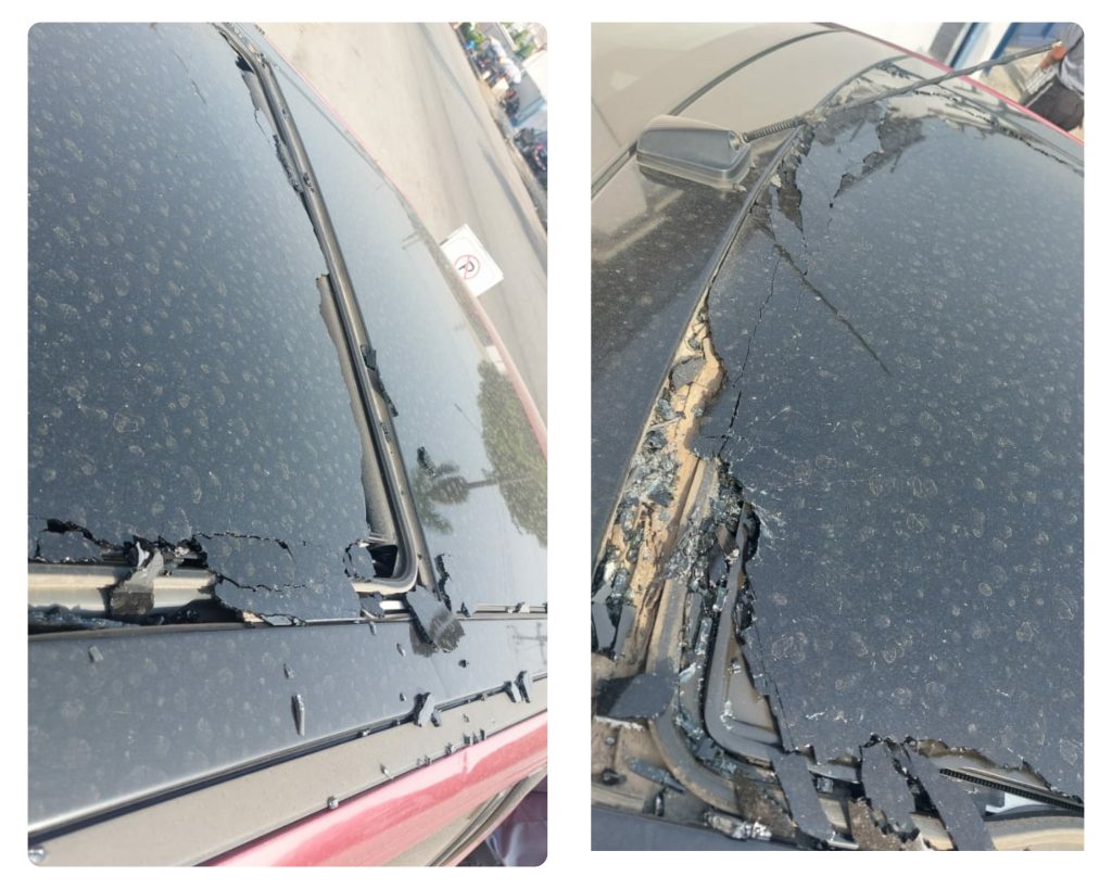 Kingsley's damaged windscreen and roof.