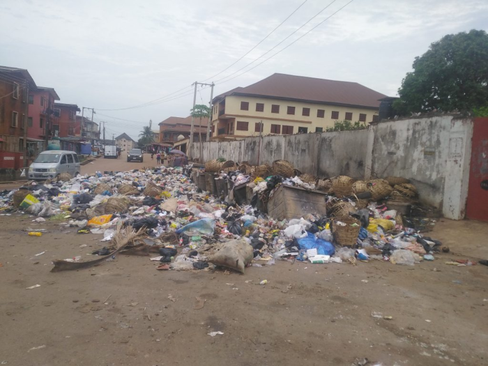 Waste overflooding a street in Enugu