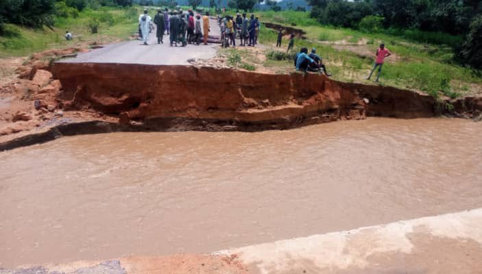 Flood splits road in Bauchi. PHOTO CREDIT: The Punch