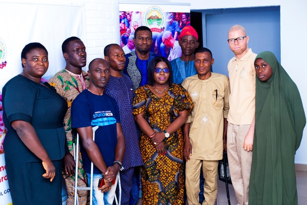 Mary Omotosho pictured with leaders of PWD rights advocacy groups.