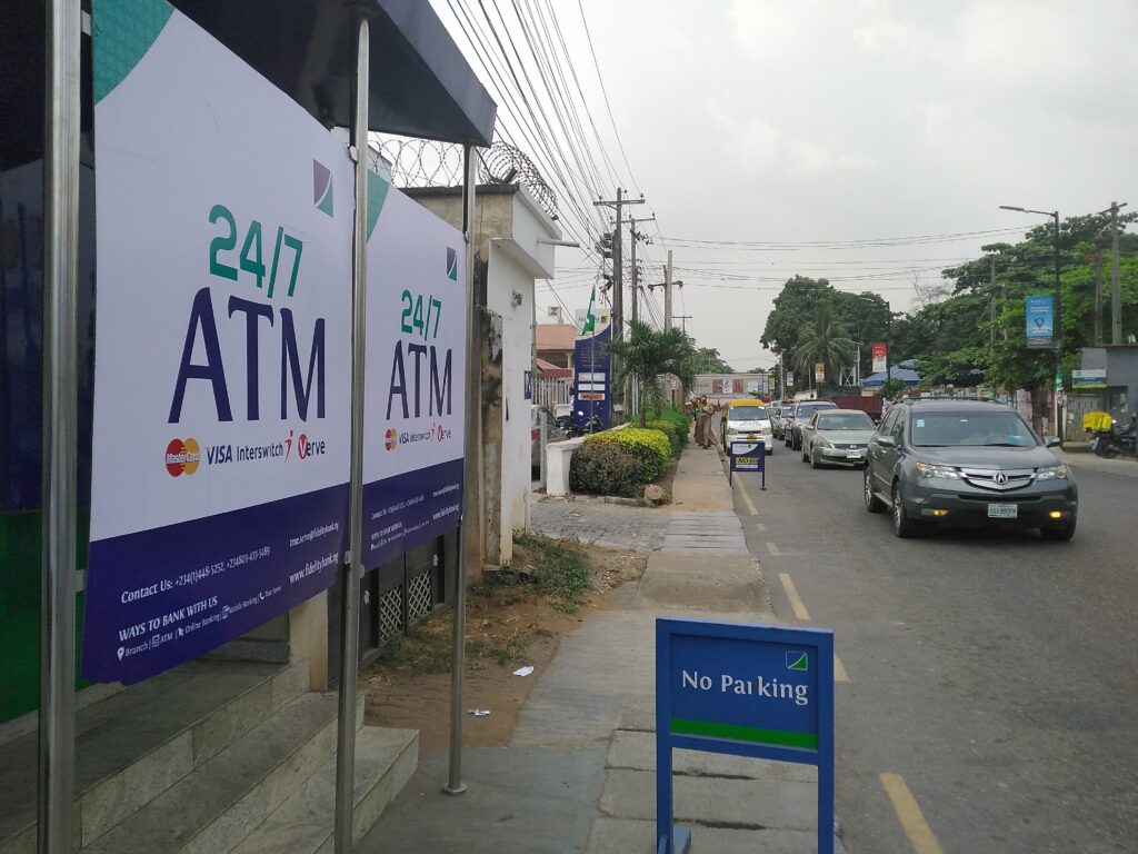 ATM at Fidelity Bank on Isaac John Street, Ikeja. Zenith Bank and First Bank can be seen in close proximity. 