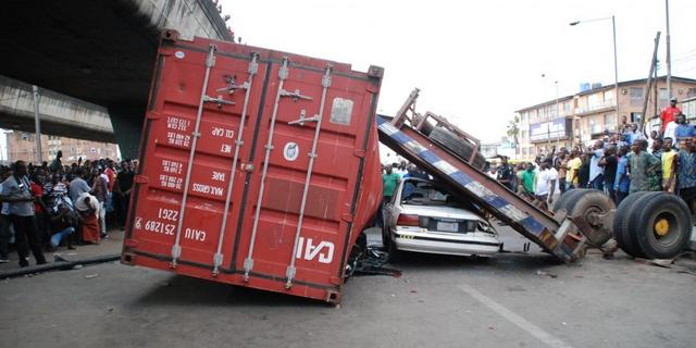 VIDEO: Another Container Falls Off Trailer in Oshodi After Brake Failure