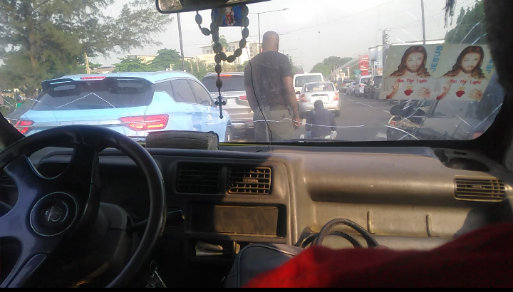 VIDEO: 'Soldier' Hits Bus in Lagos Traffic, Then Orders Driver to Do Frog Jumps