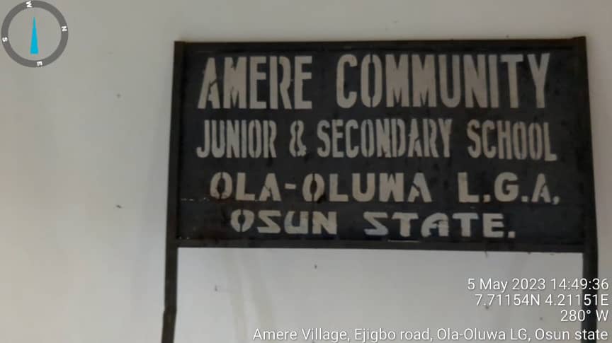 The signboard of the school kept in a classroom