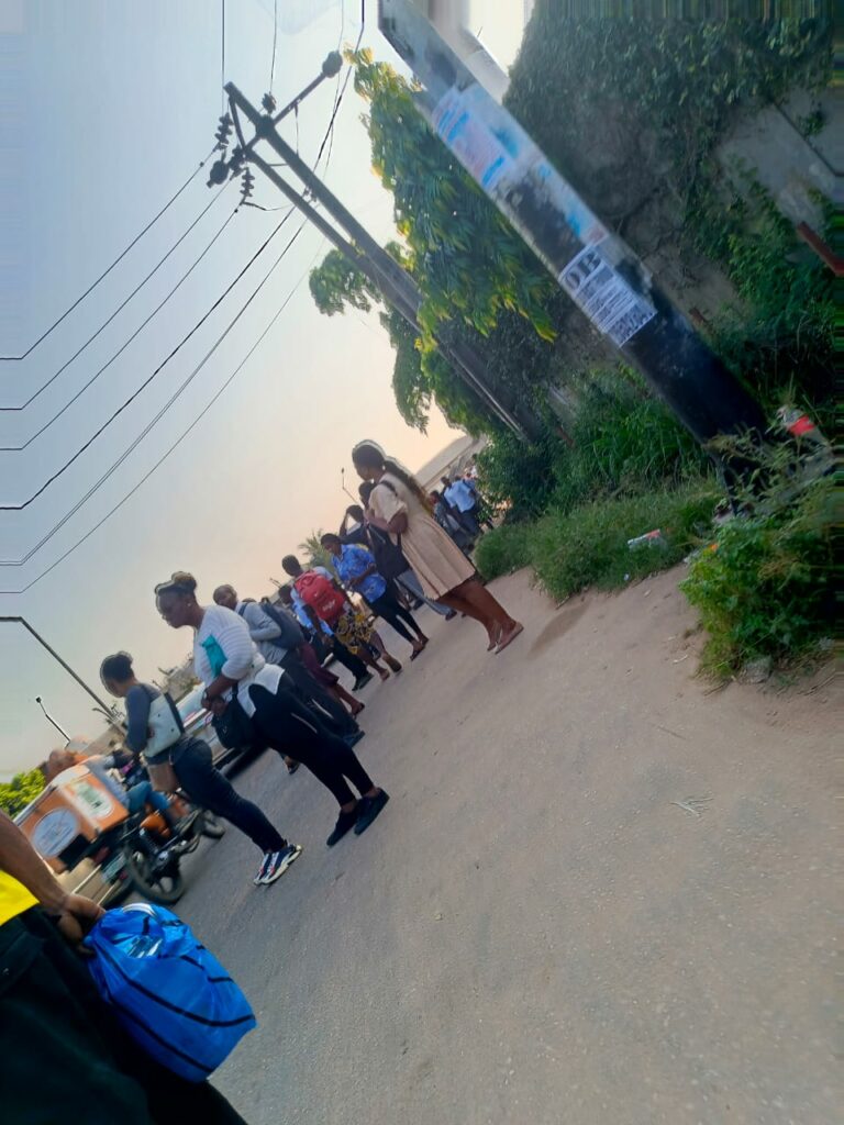 Stranded passengers by Iyana-Ipaja road leading to Ikeja on Monday morning