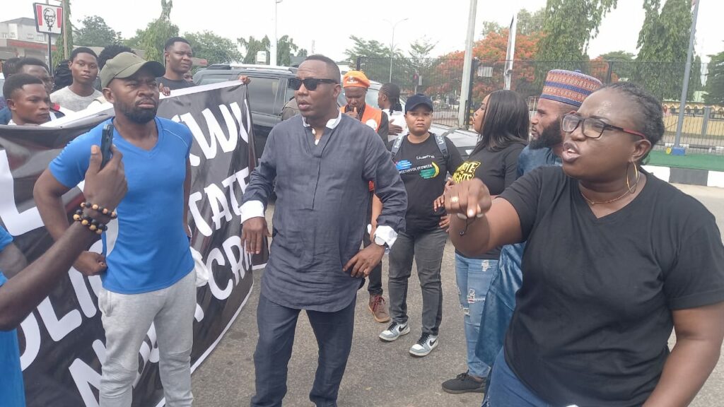 Human rights activist, Omoyele Sowore, and Bukky Shonibare at the protest scene 